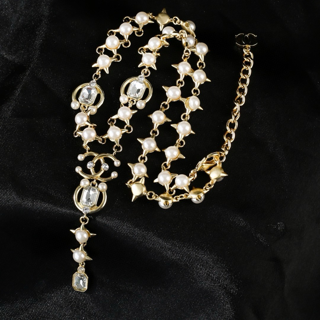 Chanel 2021 CC Logo Star Pearl Crystal Lariat Necklace necklace gold-tone metal white pearl clear crystal 40cm with 5cm extender