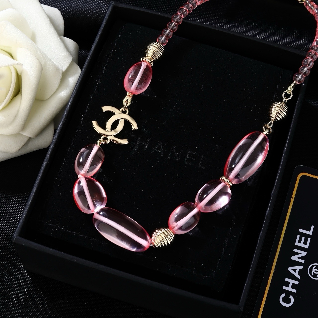 Chanel CC Logo Pink Resin Bead Necklace necklace Light gold tone metal translucent pink resin beads 42cm with 5cm extender chain