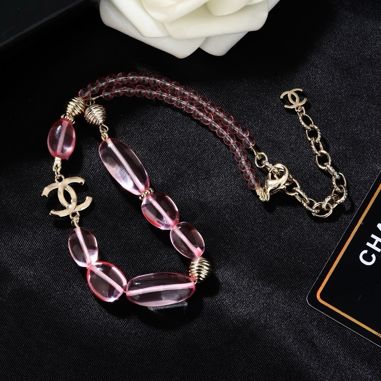 Chanel CC Logo Pink Resin Bead Necklace necklace Light gold tone metal translucent pink resin beads 42cm with 5cm extender chain