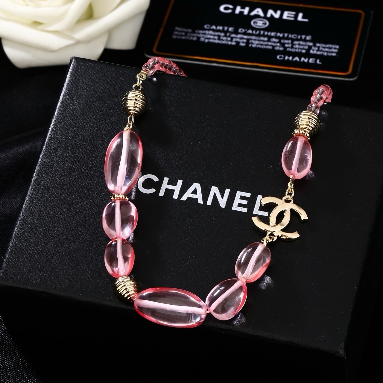 Chanel CC Logo Pink Resin Bead Necklace necklace Light gold tone metal translucent pink resin beads 42cm with 5cm extender chain