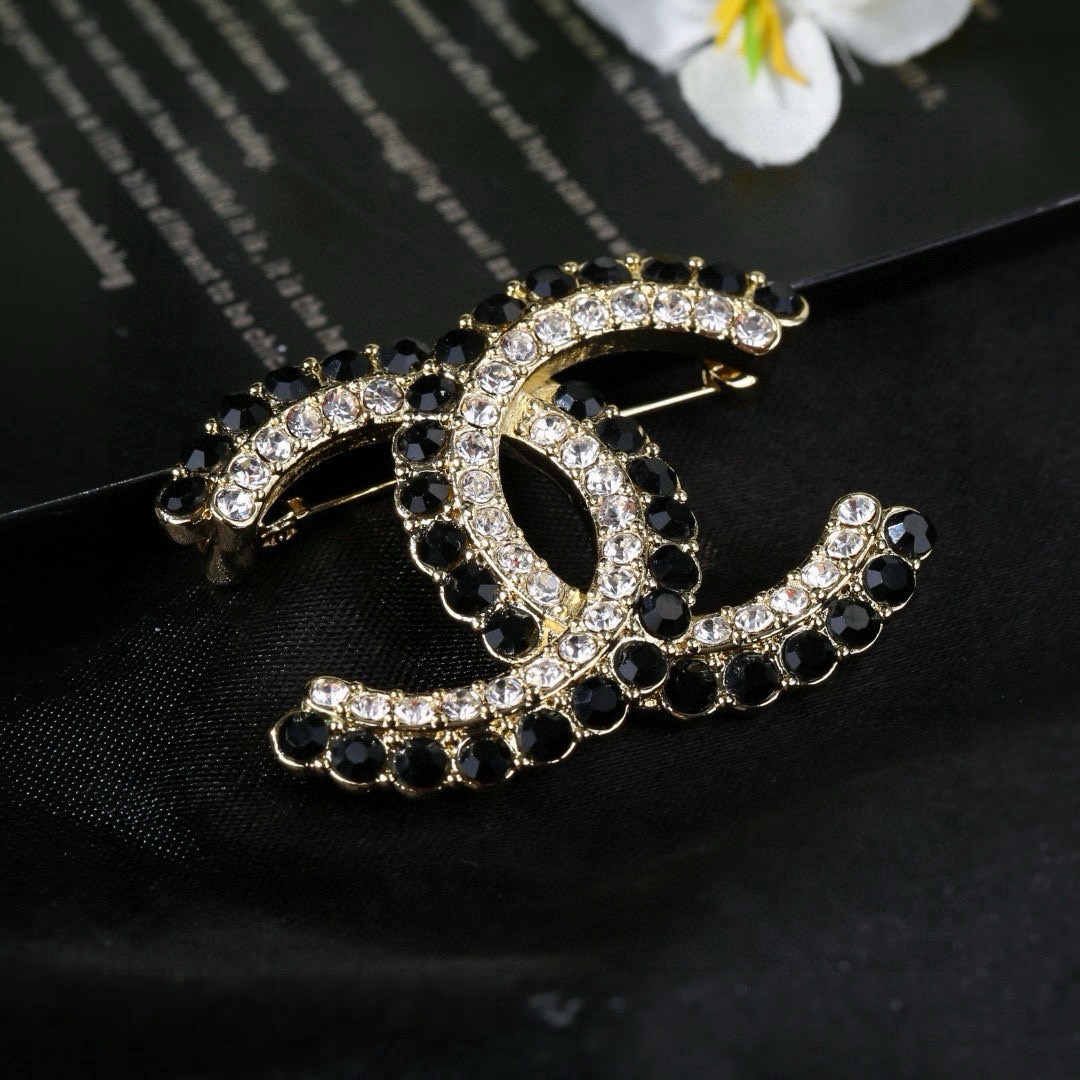 Chanel CC Double C Logo Crystal Brooch brooch gold-tone metal with clear crystals and black faceted stones 3 5cm width