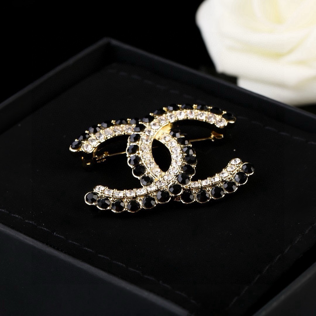 Chanel CC Double C Logo Crystal Brooch brooch gold-tone metal with clear crystals and black faceted stones 3 5cm width