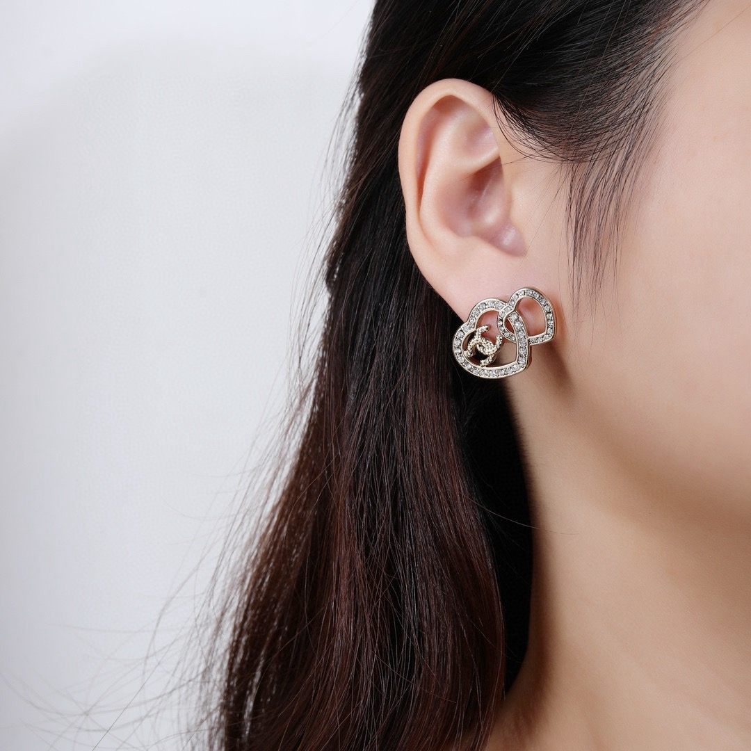 Chanel Interlocking CC Double Heart Crystal Stud Earrings earrings light gold tone metal with clear crystal accents 2cm width per earring