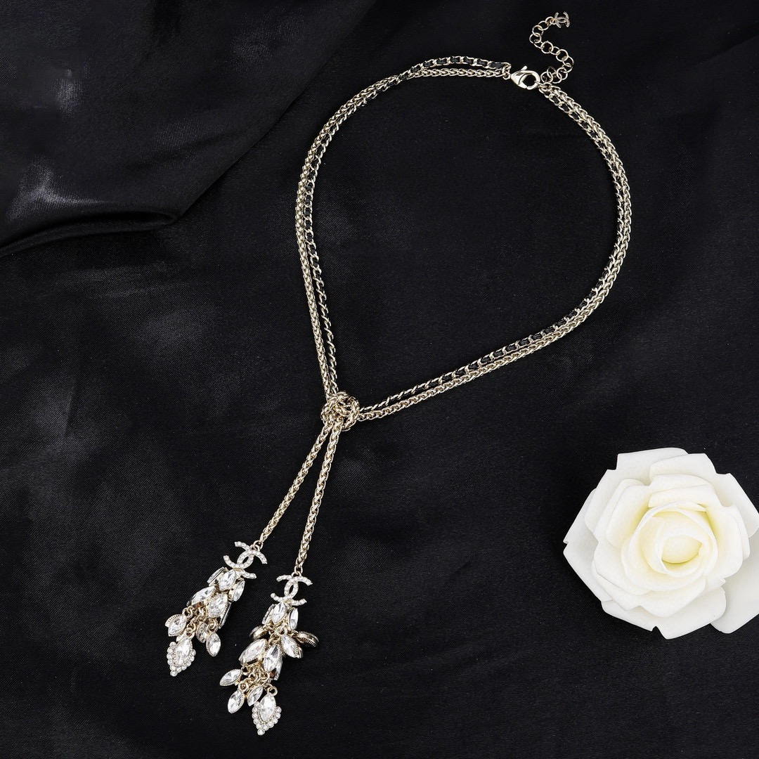 Chanel 2021 CC Crystal Tassel Lariat necklace light gold metal with clear faceted crystals 42cm with 5cm extender
