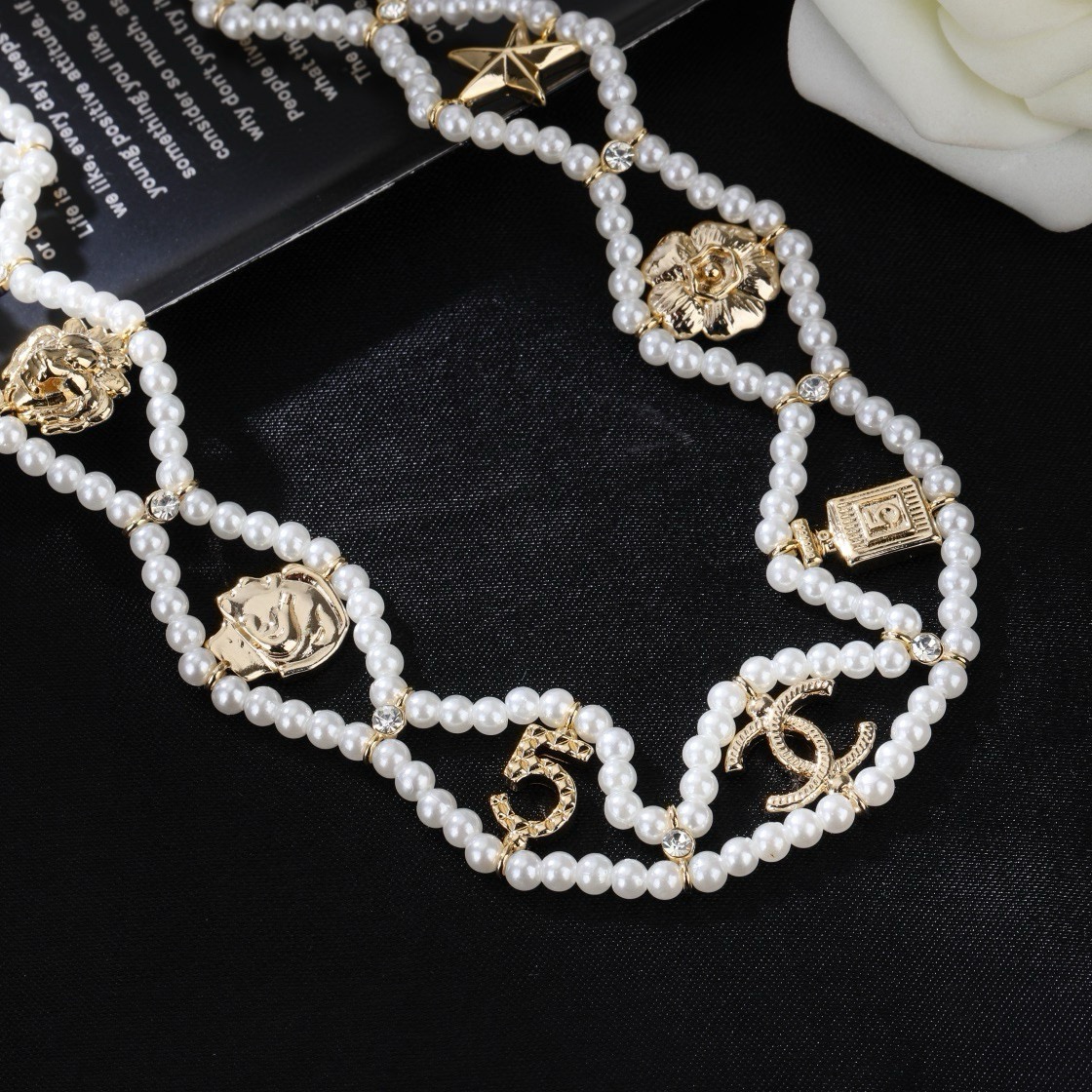 Chanel CC Logo No 5 Camellia Charm Pearl Choker necklace Gold-tone metal white faux pearl clear crystal 38cm with 5cm extender