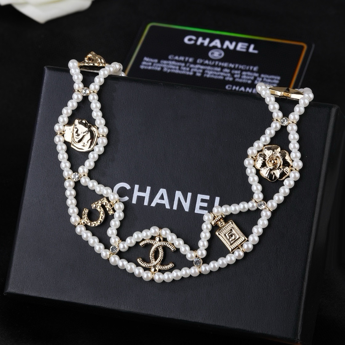 Chanel CC Logo No 5 Camellia Charm Pearl Choker necklace Gold-tone metal white faux pearl clear crystal 38cm with 5cm extender