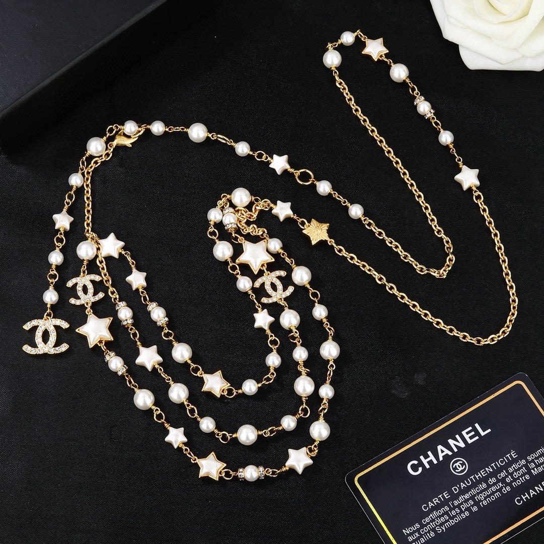 Chanel Goose Star CC Pearl Multi-Strand Waist Chain necklace Gold-tone metal white faux pearl white enamel star clear crystal 80cm