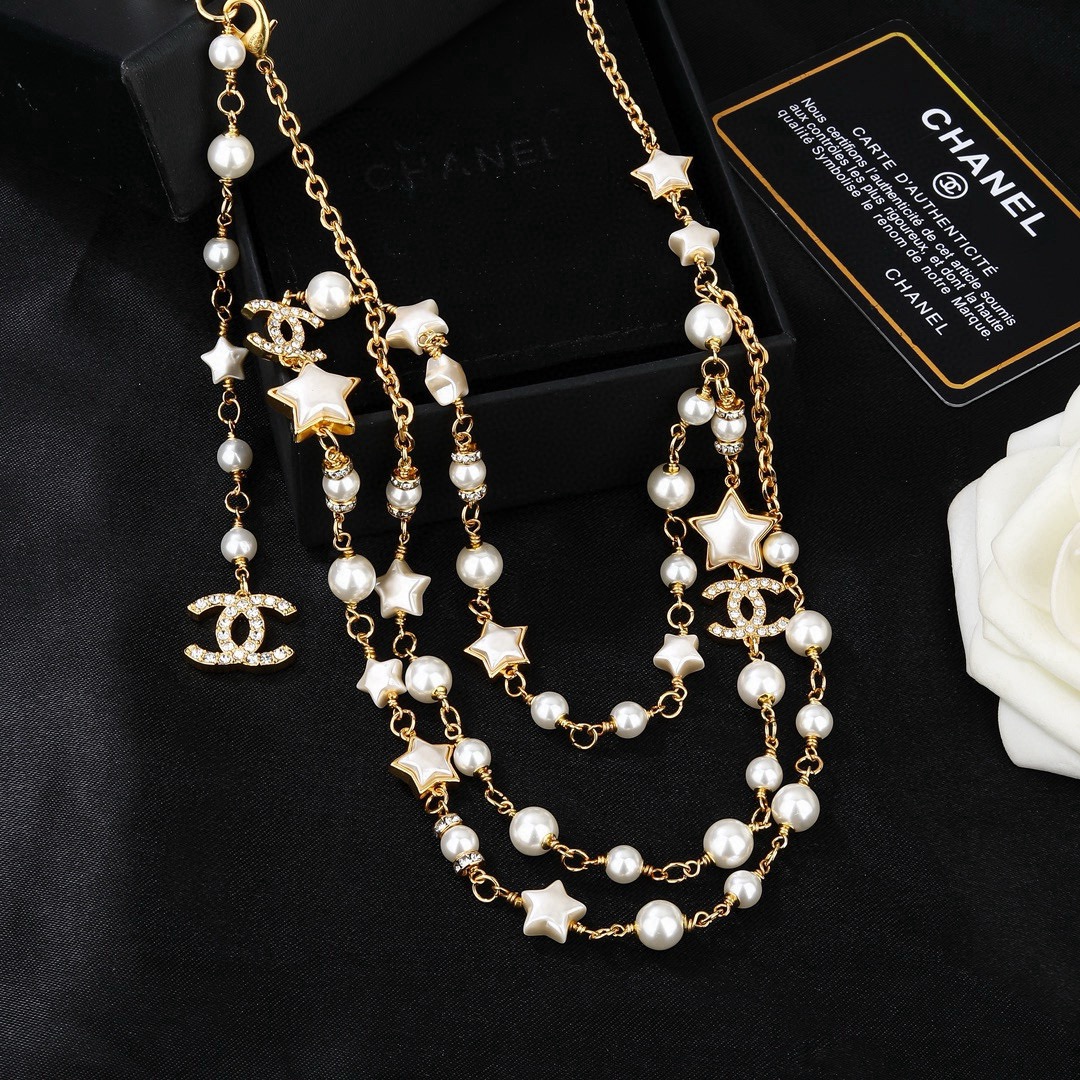 Chanel Goose Star CC Pearl Multi-Strand Waist Chain necklace Gold-tone metal white faux pearl white enamel star clear crystal 80cm