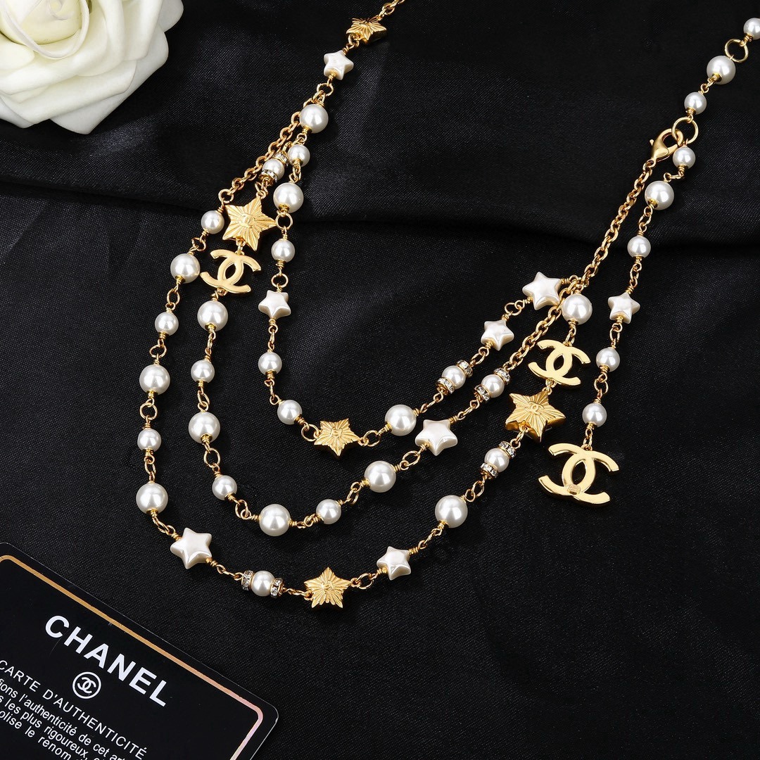 Chanel Goose Star CC Pearl Multi-Strand Waist Chain necklace Gold-tone metal white faux pearl white enamel star clear crystal 80cm