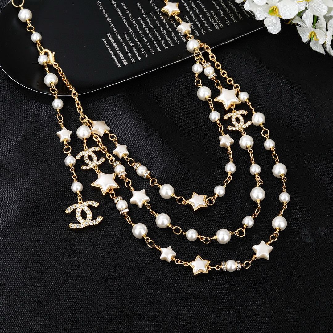 Chanel Goose Star CC Pearl Multi-Strand Waist Chain necklace Gold-tone metal white faux pearl white enamel star clear crystal 80cm