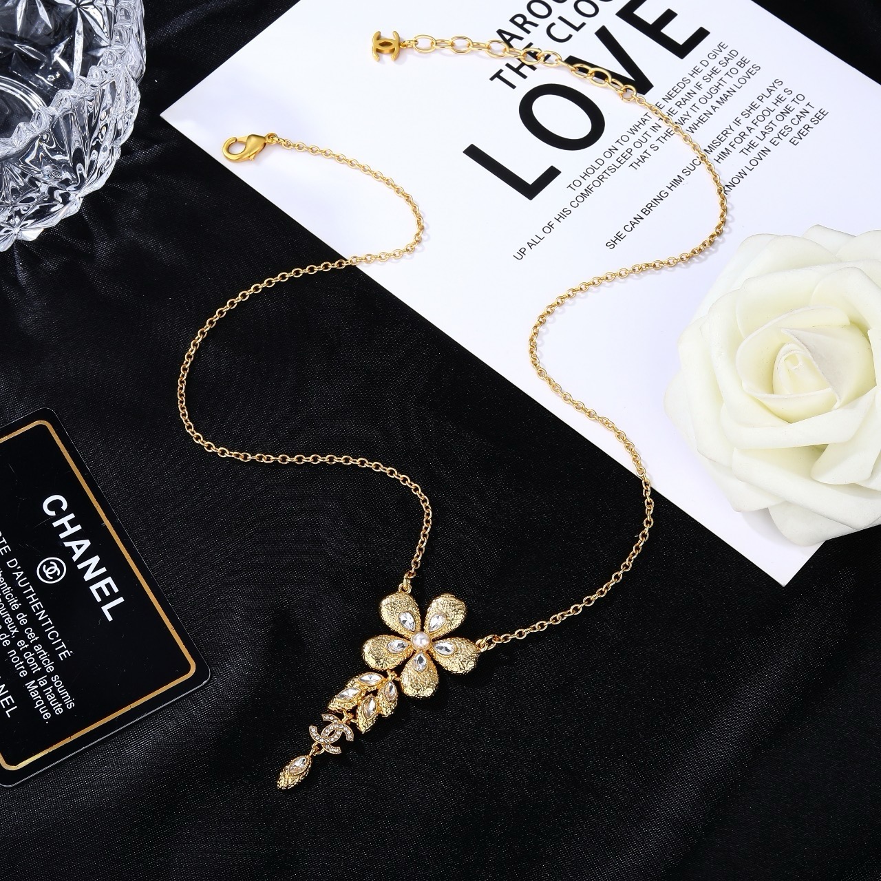 Chanel CC Flower Drop Pendant necklace Gold-tone metal clear crystals faux pearl center 42cm with 5cm extender