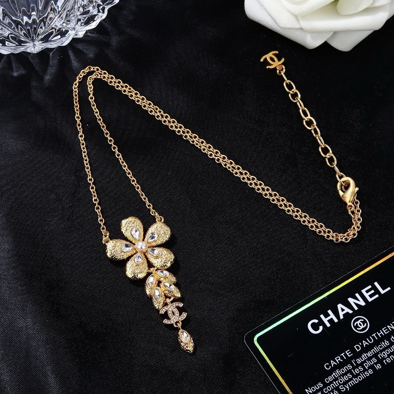 Chanel CC Flower Drop Pendant necklace Gold-tone metal clear crystals faux pearl center 42cm with 5cm extender