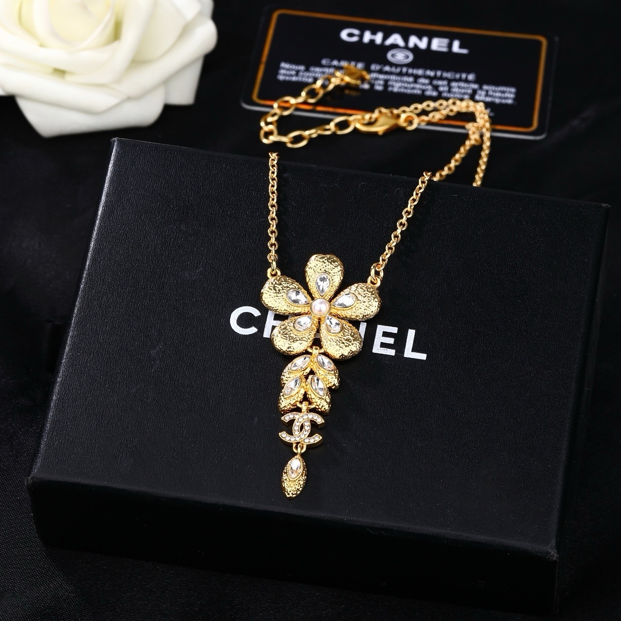 Chanel CC Flower Drop Pendant necklace Gold-tone metal clear crystals faux pearl center 42cm with 5cm extender