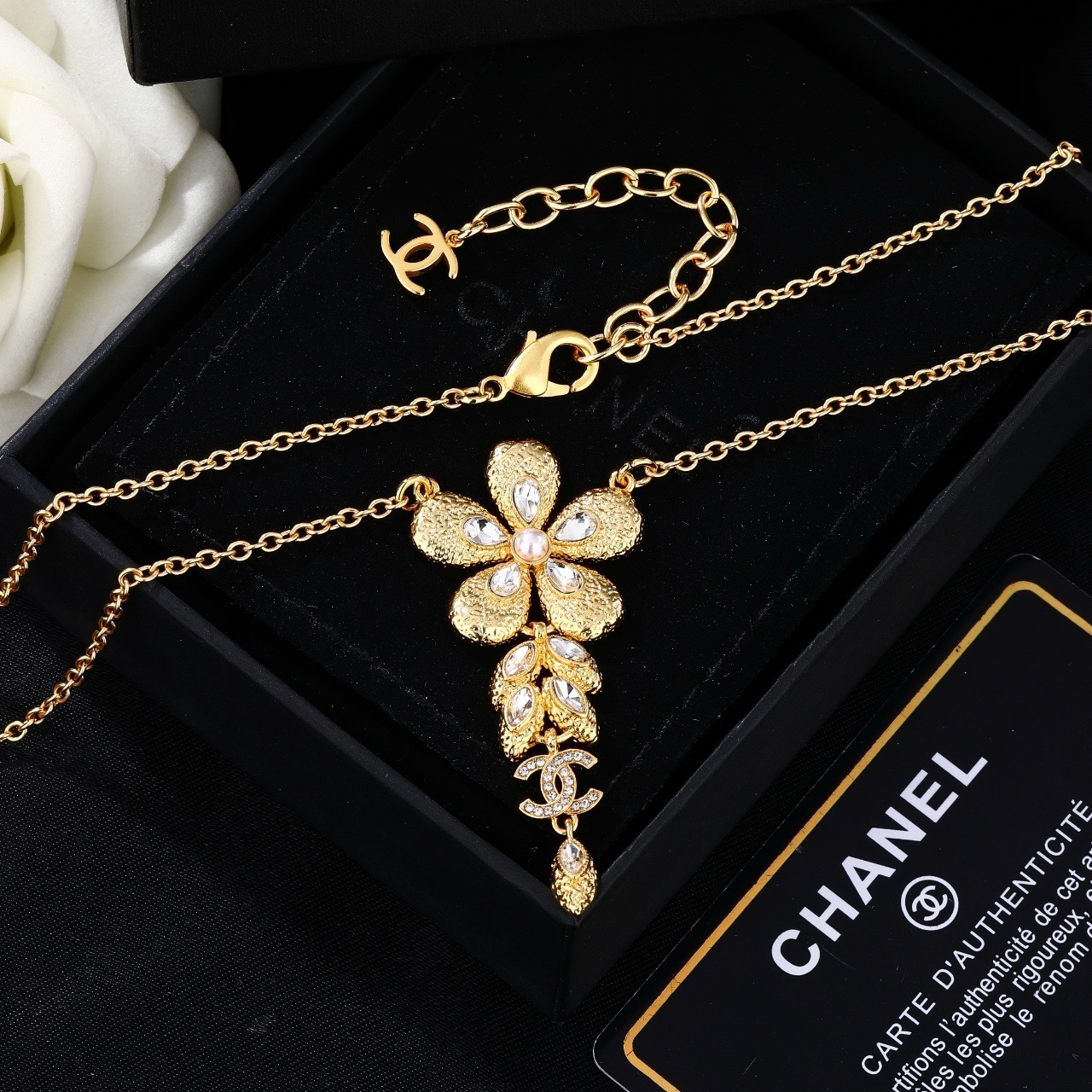 Chanel CC Flower Drop Pendant necklace Gold-tone metal clear crystals faux pearl center 42cm with 5cm extender