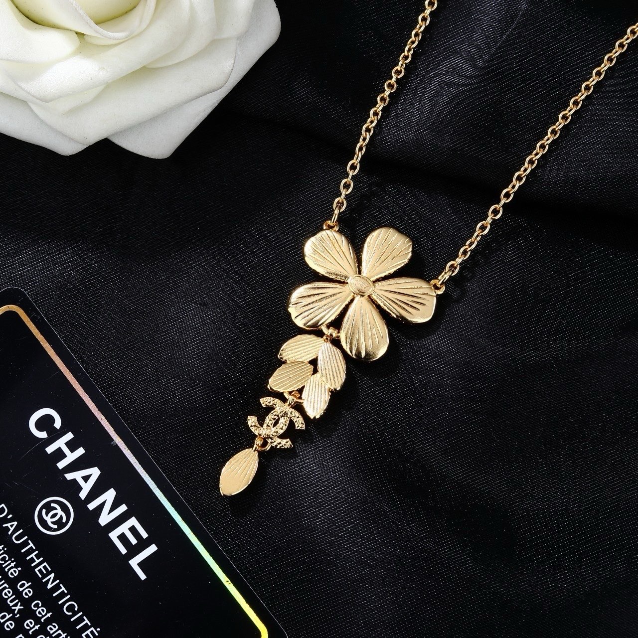Chanel CC Flower Drop Pendant necklace Gold-tone metal clear crystals faux pearl center 42cm with 5cm extender