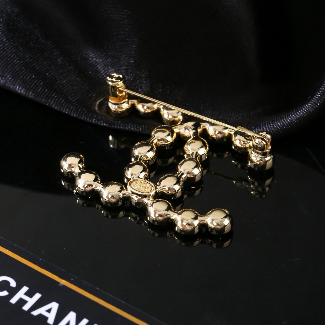 Chanel CC Crystal Brooch brooch gold-tone metal with clear faceted crystals 3 5cm width