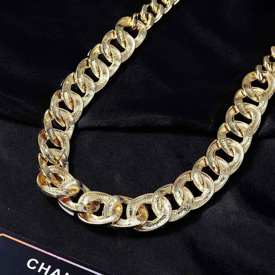 Chanel CC Logo Curb Chain necklace Gold-tone metal with black enamel and pearlescent white accents Adjustable 40-45cm