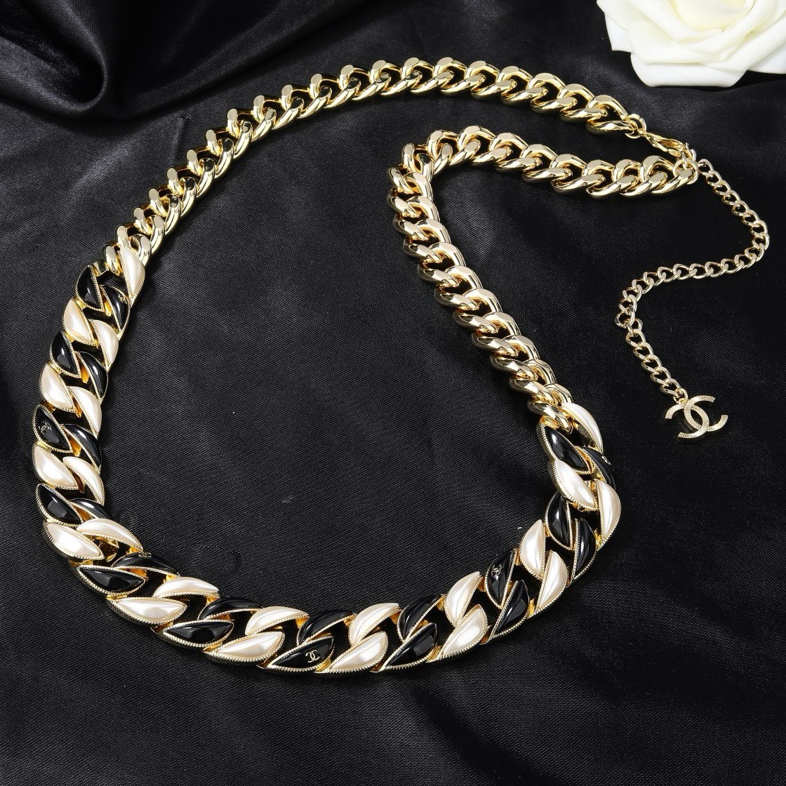 Chanel CC Logo Curb Chain necklace Gold-tone metal with black enamel and pearlescent white accents Adjustable 40-45cm