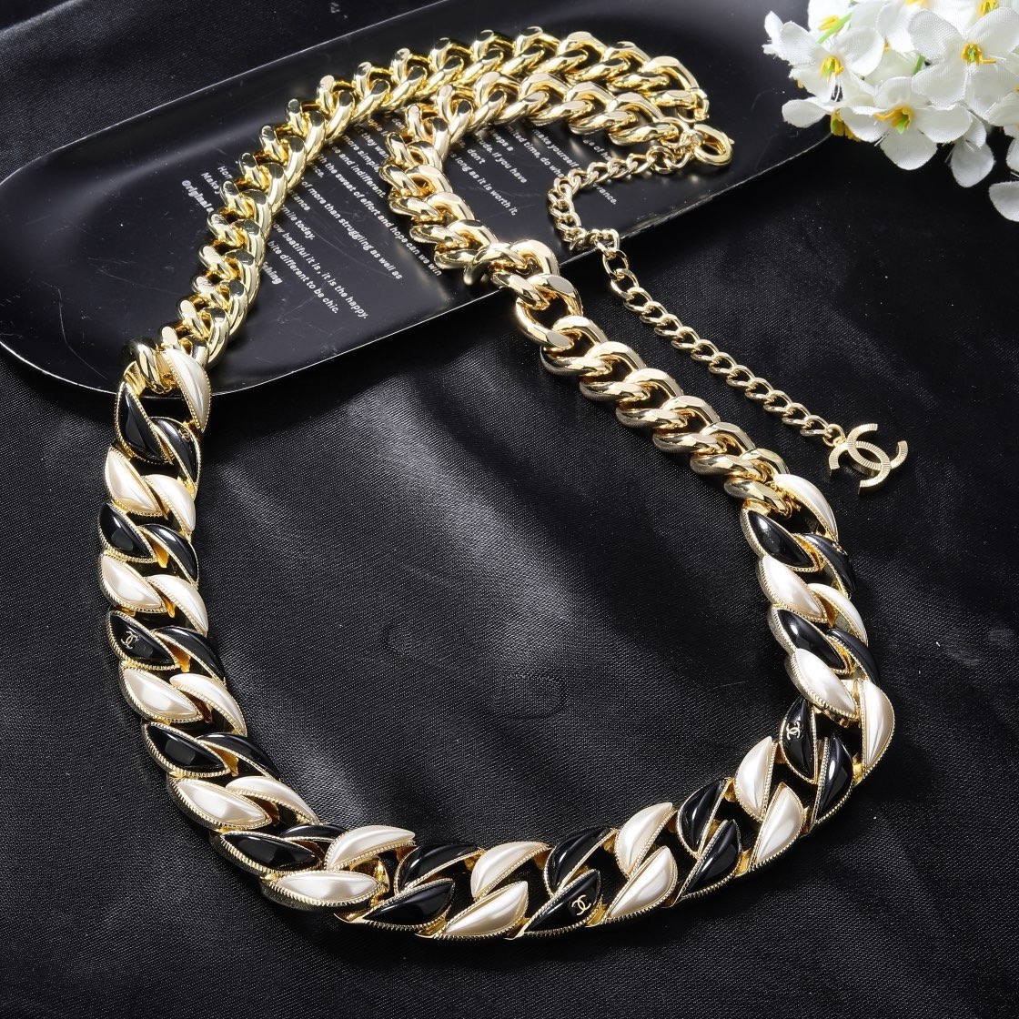 Chanel CC Logo Curb Chain necklace Gold-tone metal with black enamel and pearlescent white accents Adjustable 40-45cm