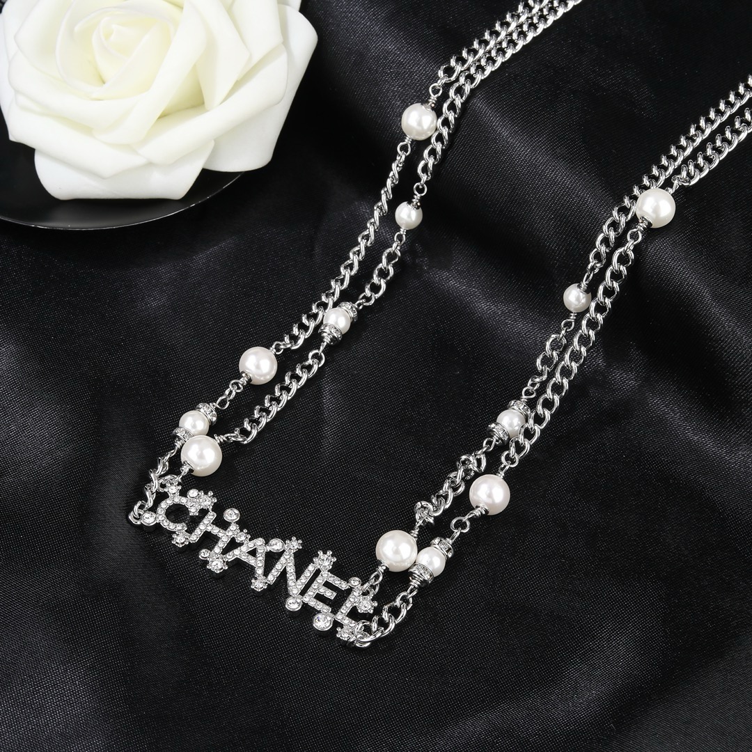 Chanel Crystal Letter Logo Pearl Chain necklace Silver-toned metal white faux pearls clear crystal rhinestones 80cm with 10cm extender