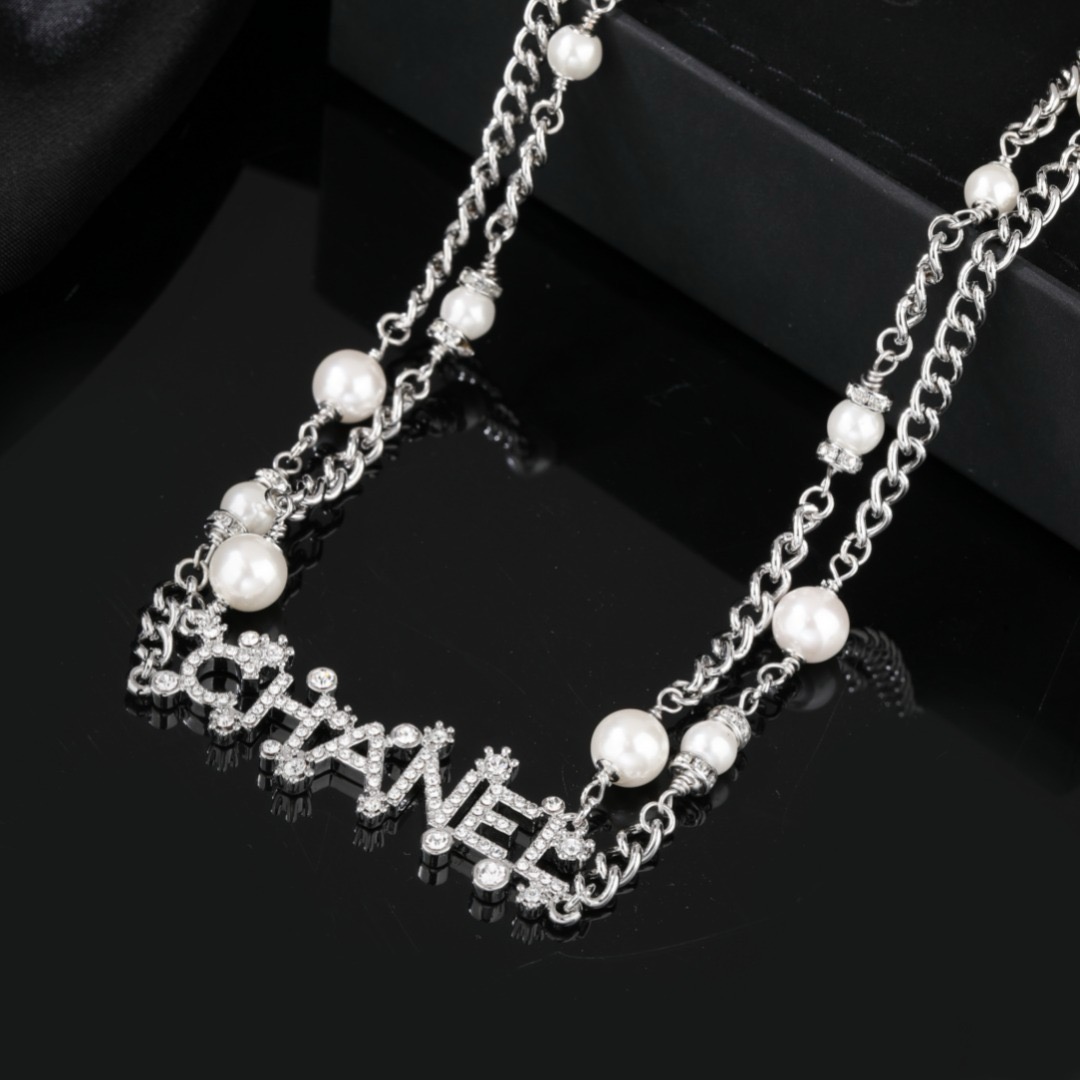 Chanel Crystal Letter Logo Pearl Chain necklace Silver-toned metal white faux pearls clear crystal rhinestones 80cm with 10cm extender