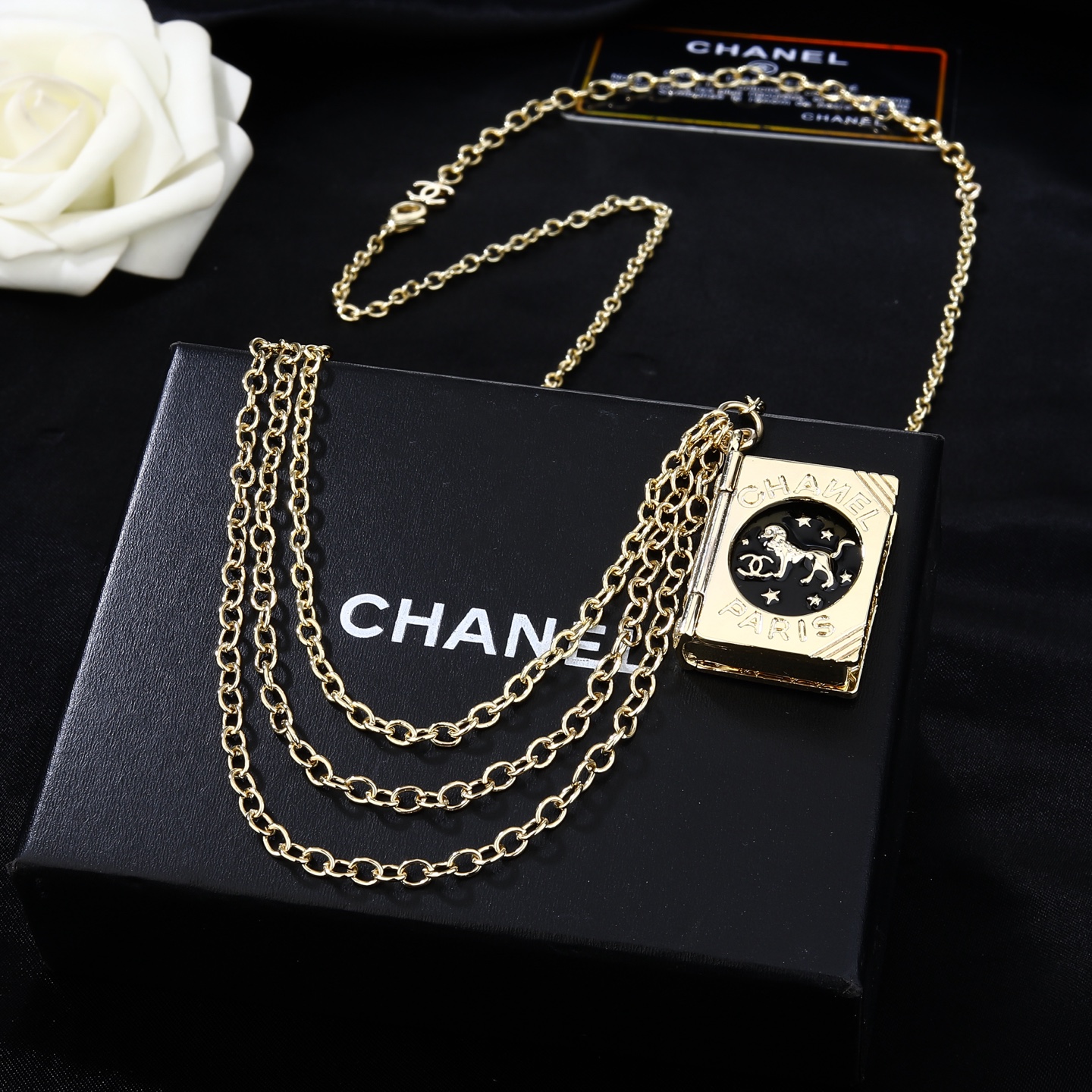 Chanel Goose series Lion Book Locket Waist Chain necklace Gold-tone metal with black enamel and silver-tone lion CC logo detailing 80cm