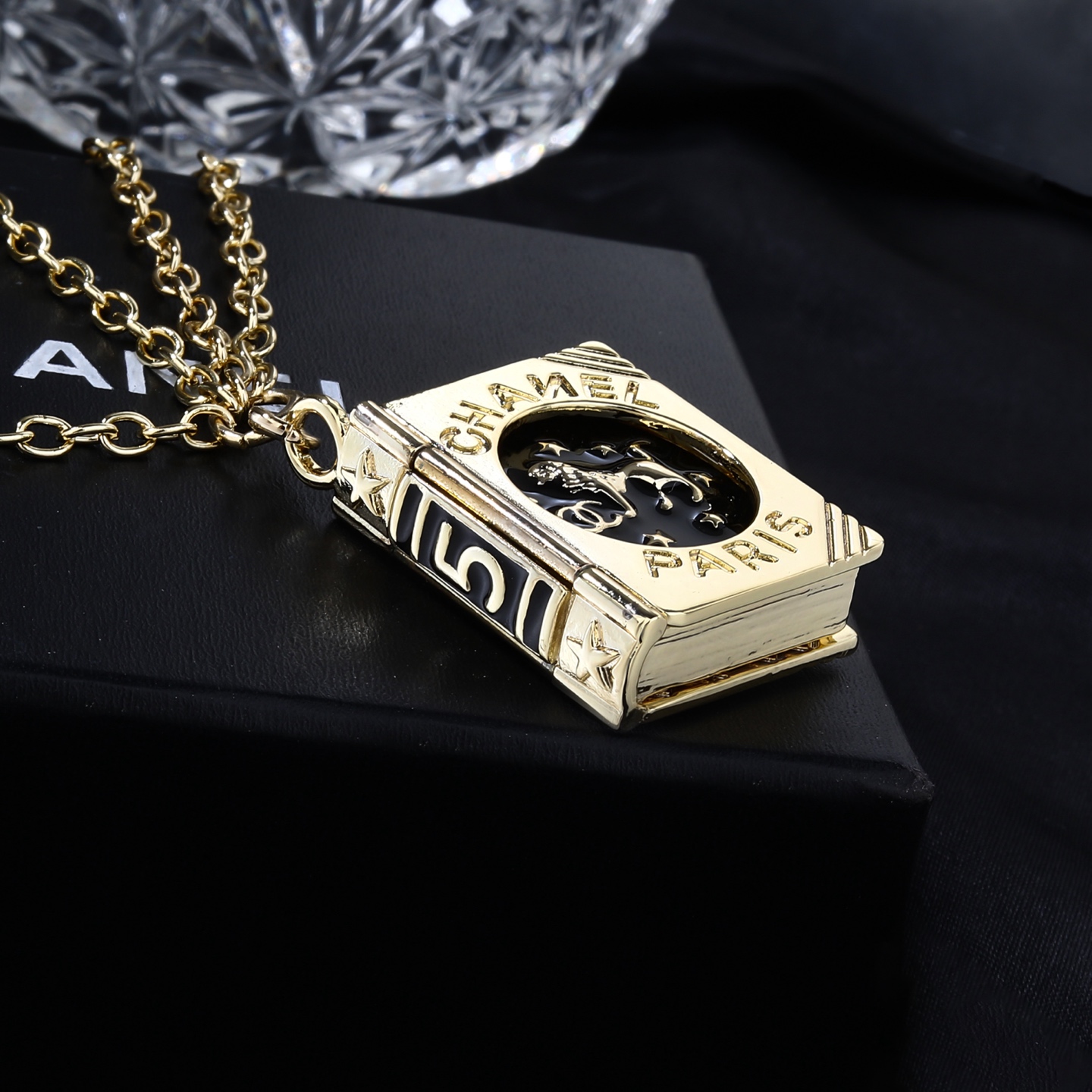 Chanel Goose series Lion Book Locket Waist Chain necklace Gold-tone metal with black enamel and silver-tone lion CC logo detailing 80cm