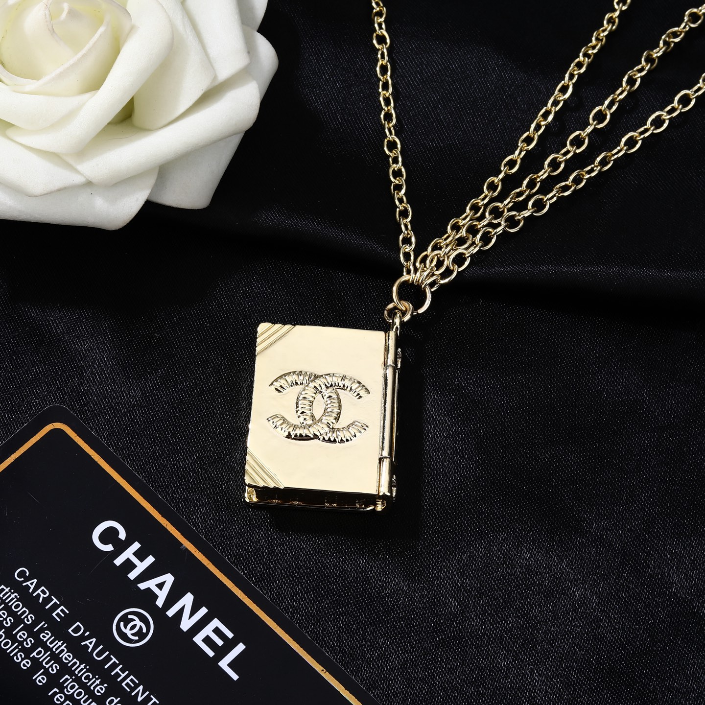 Chanel Goose series Lion Book Locket Waist Chain necklace Gold-tone metal with black enamel and silver-tone lion CC logo detailing 80cm