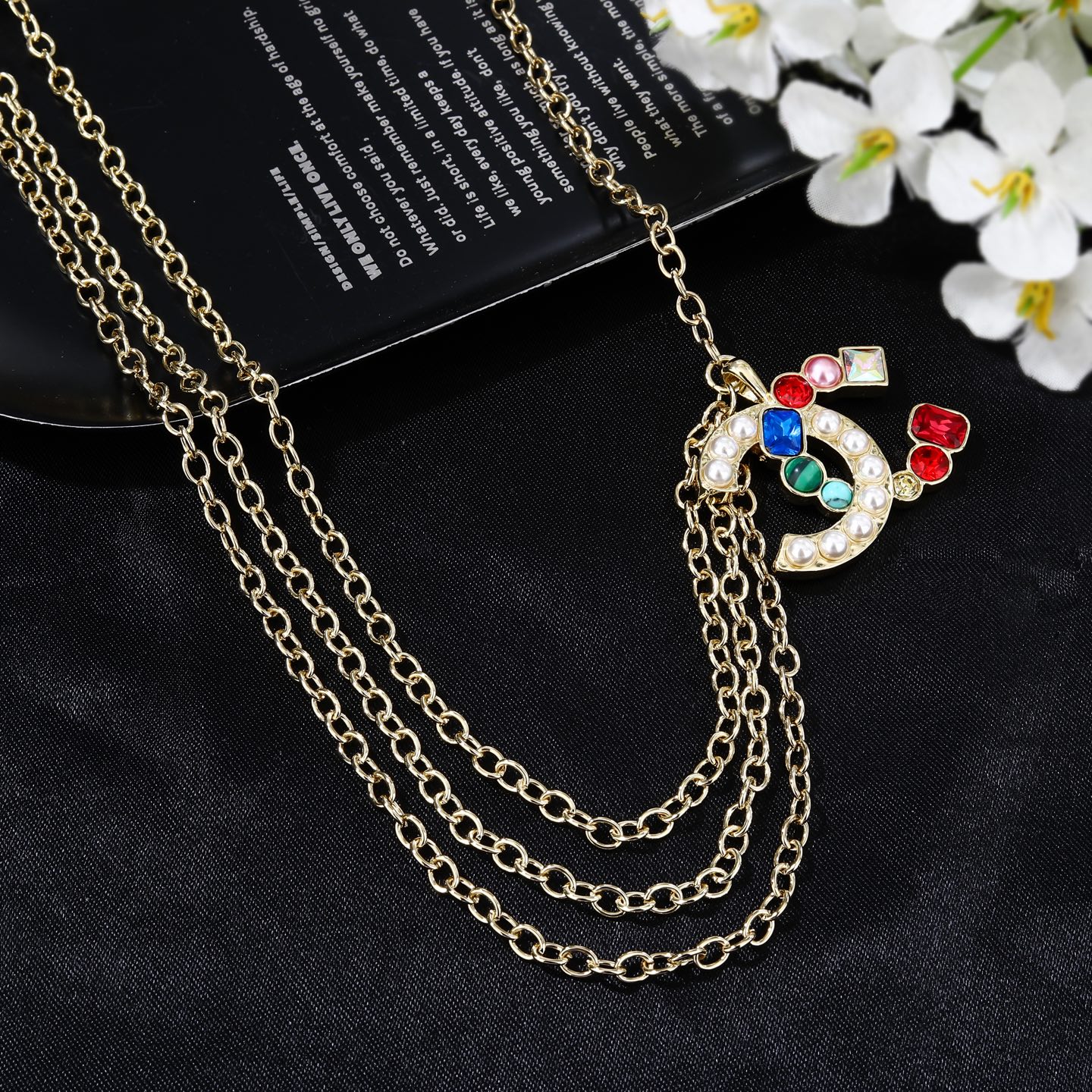 Chanel Goose series multicolor gemstone CC logo waist chain necklace gold-tone metal with white faux pearls multicolor gemstones red blue green pink clear 80cm