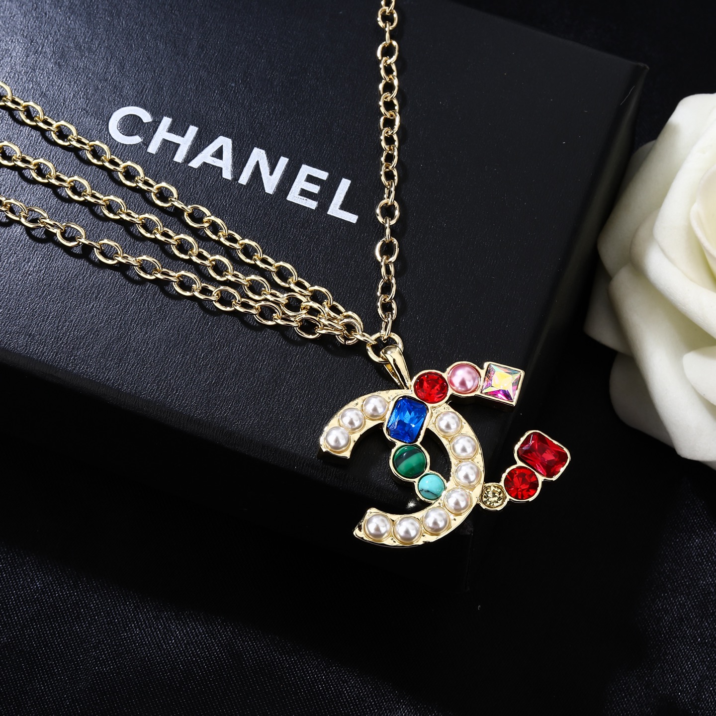 Chanel Goose series multicolor gemstone CC logo waist chain necklace gold-tone metal with white faux pearls multicolor gemstones red blue green pink clear 80cm