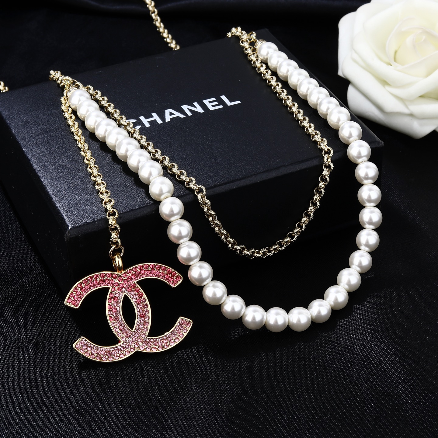 Chanel Goose series CC logo pearl chain necklace gold-tone metal white faux pearl pink crystal 80cm adjustable