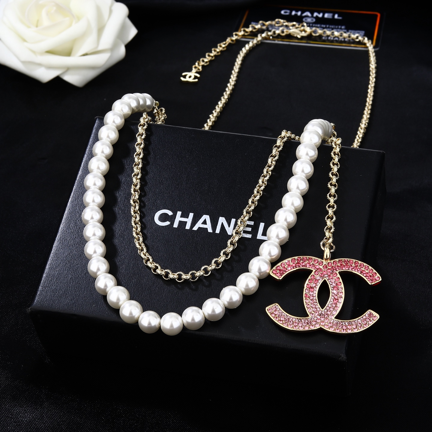 Chanel Goose series CC logo pearl chain necklace gold-tone metal white faux pearl pink crystal 80cm adjustable