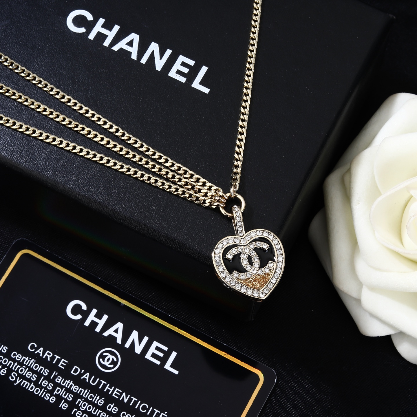 Chanel Goose Heart CC Pendant Waist Chain necklace Light gold metal clear crystal black enamel champagne crystal 80cm with 10cm extension