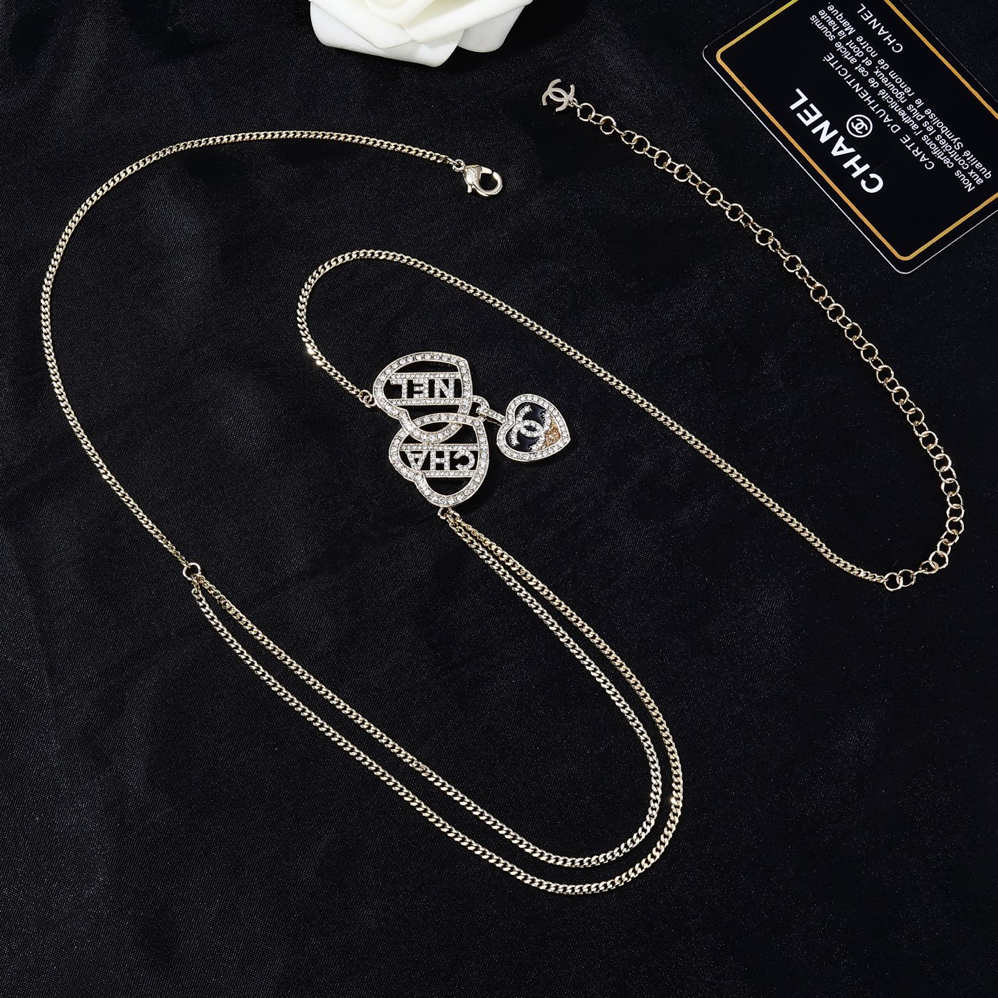 Chanel Goose Heart Logo Waist Chain necklace Gold-tone metal with clear crystal rhinestones black enamel and gold glitter accent on heart pendant 80cm with 5cm extension