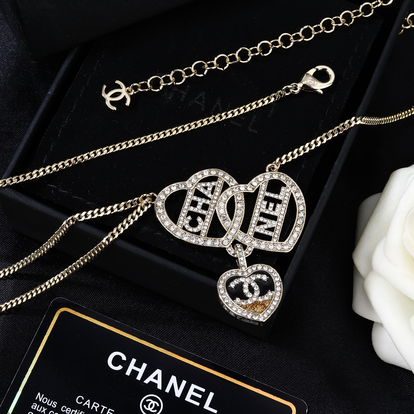 Chanel Goose Heart Logo Waist Chain necklace Gold-tone metal with clear crystal rhinestones black enamel and gold glitter accent on heart pendant 80cm with 5cm extension