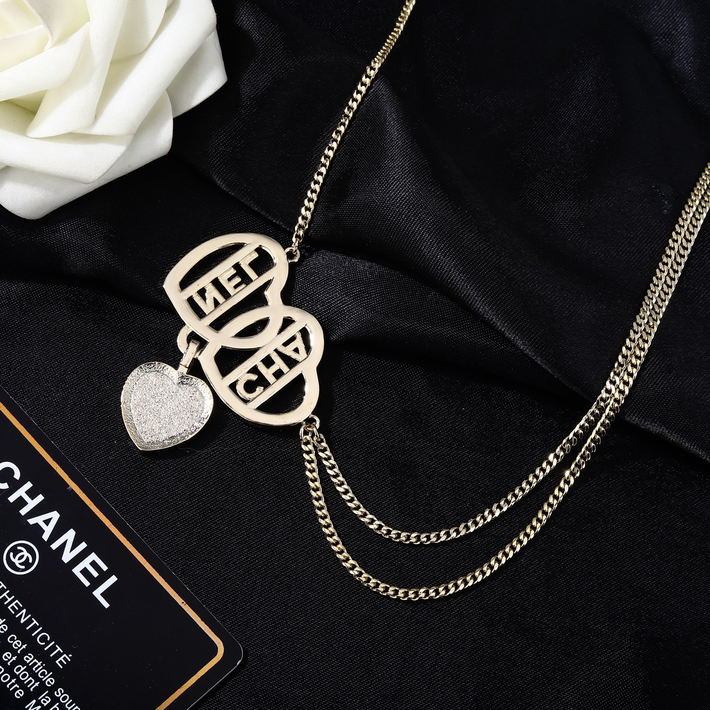 Chanel Goose Heart Logo Waist Chain necklace Gold-tone metal with clear crystal rhinestones black enamel and gold glitter accent on heart pendant 80cm with 5cm extension
