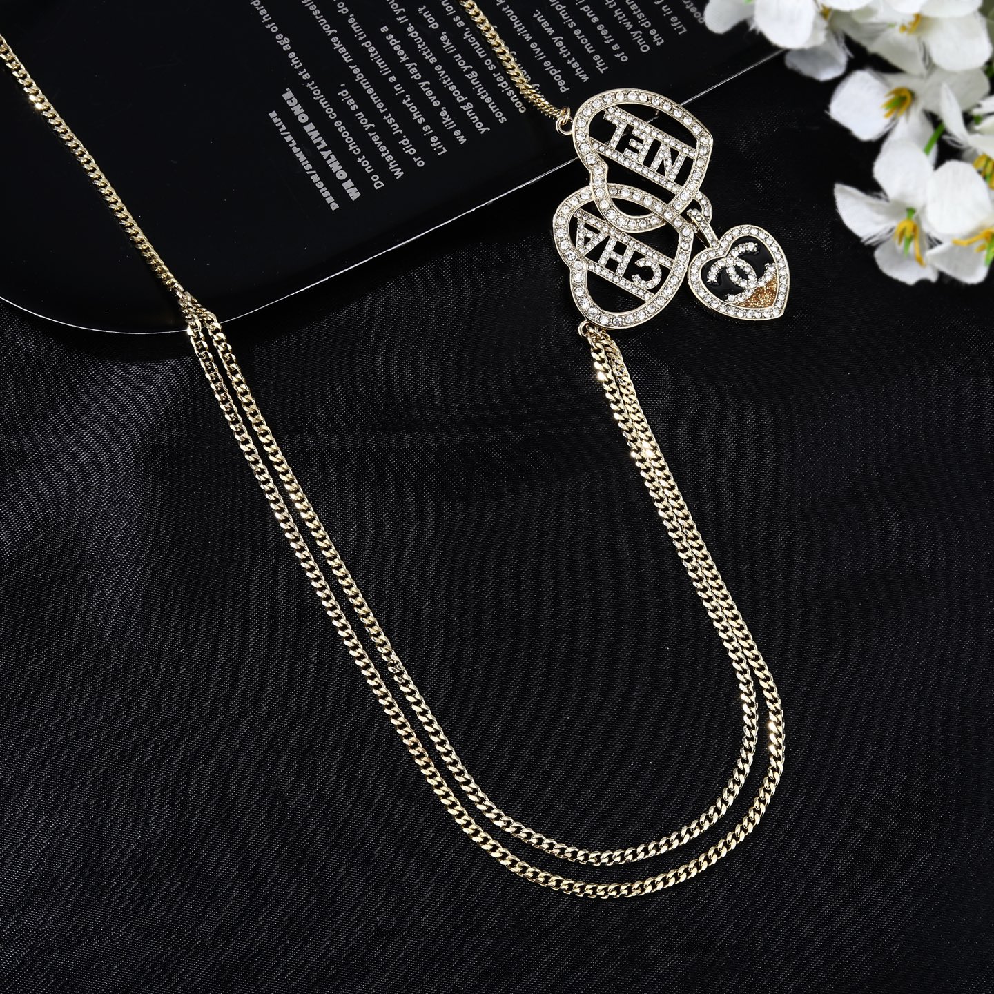 Chanel Goose Heart Logo Waist Chain necklace Gold-tone metal with clear crystal rhinestones black enamel and gold glitter accent on heart pendant 80cm with 5cm extension