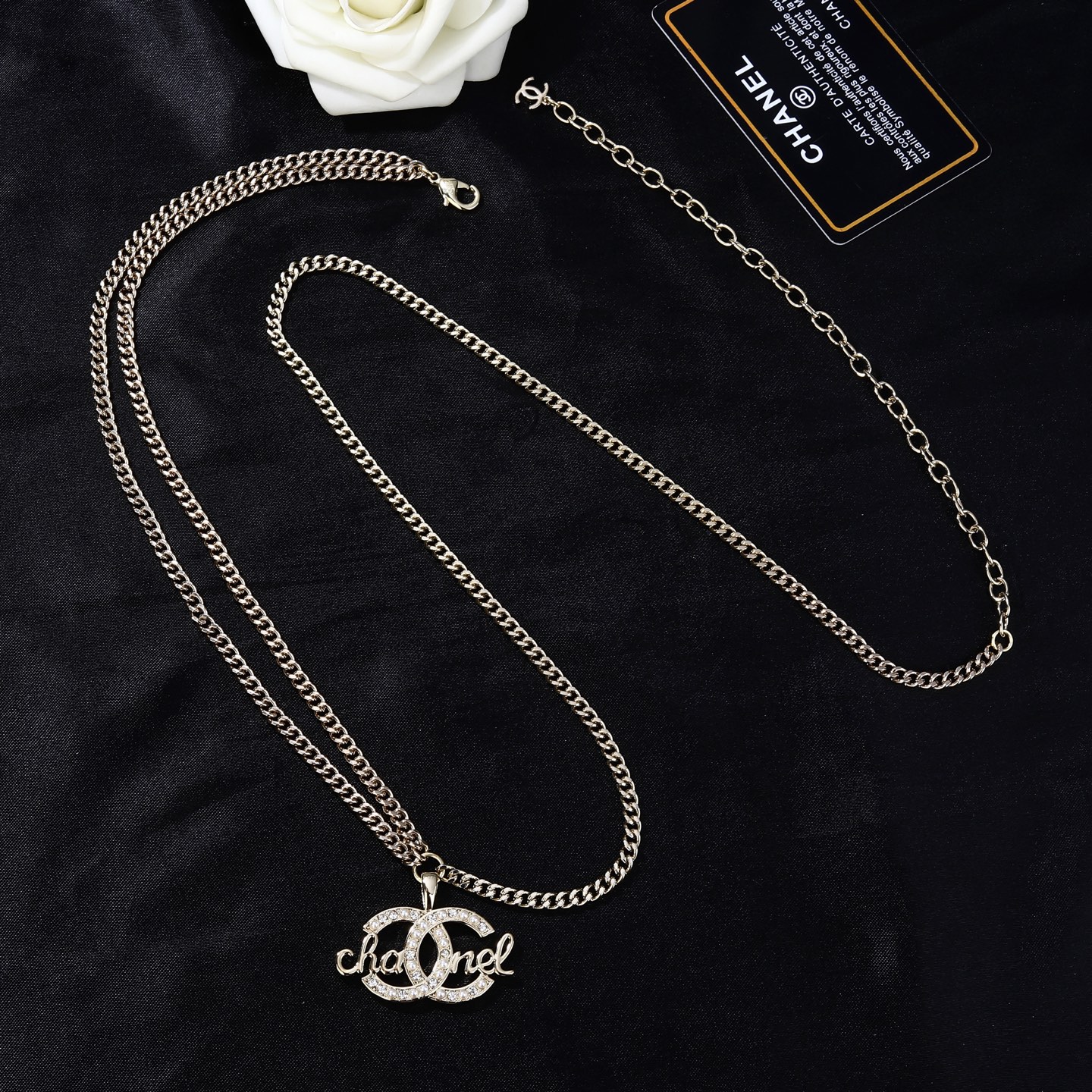 Chanel CC Script Crystal Pearl Waist Chain necklace Light gold metal with clear crystals and white pearl accents 80cm