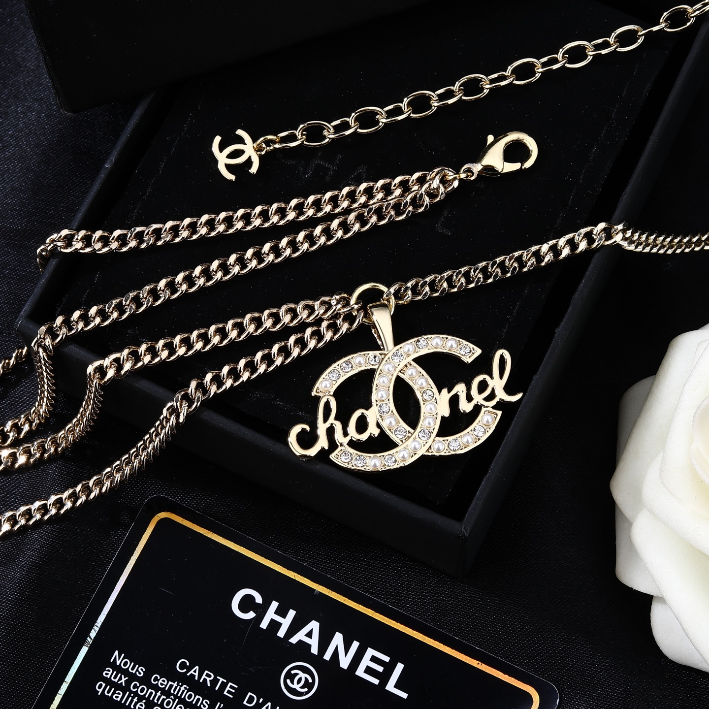 Chanel CC Script Crystal Pearl Waist Chain necklace Light gold metal with clear crystals and white pearl accents 80cm