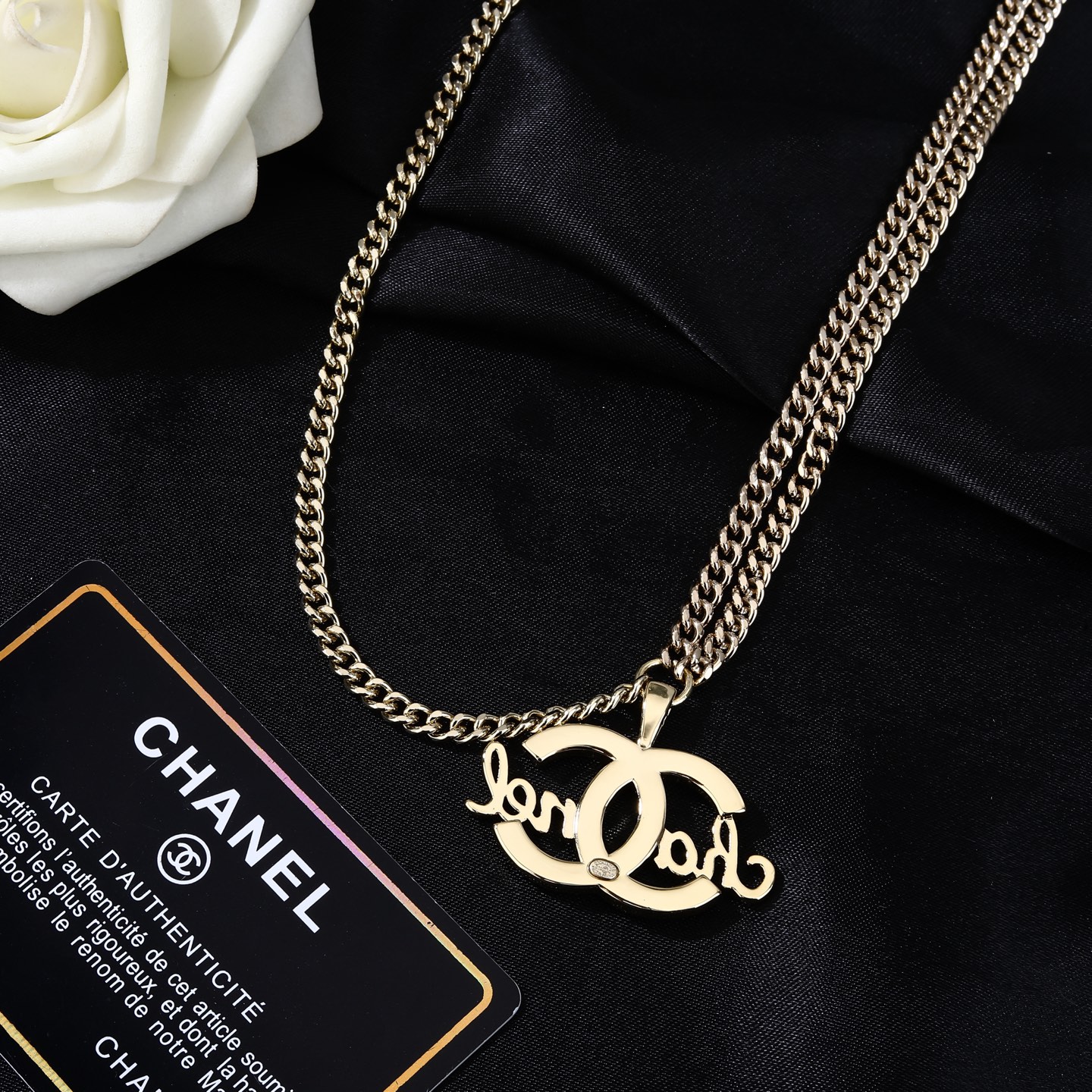 Chanel CC Script Crystal Pearl Waist Chain necklace Light gold metal with clear crystals and white pearl accents 80cm