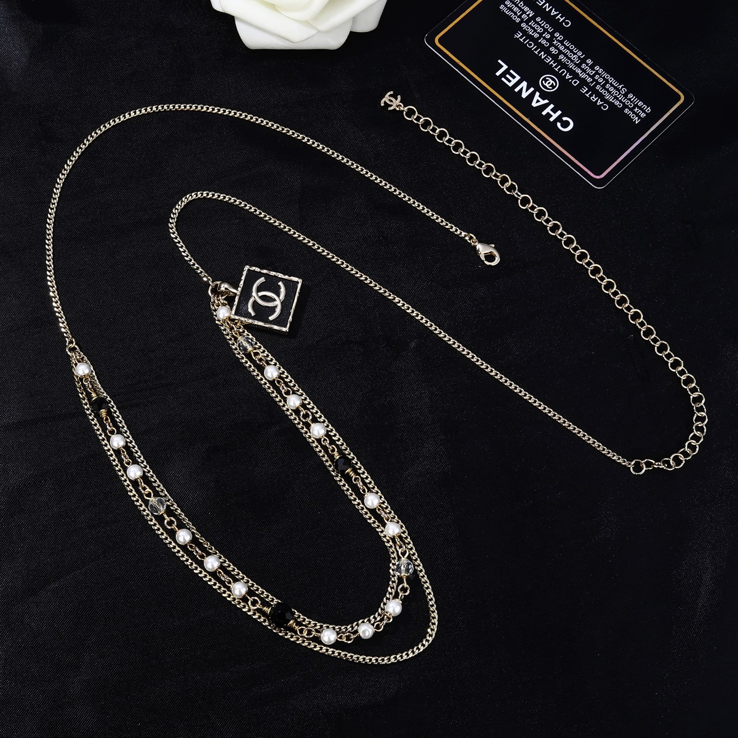 Chanel Goose Series CC Square Charm Pearl Beaded Waist Chain necklace Gold-tone metal with white faux pearls black faceted beads clear faceted beads and black enamel CC charm 80cm
