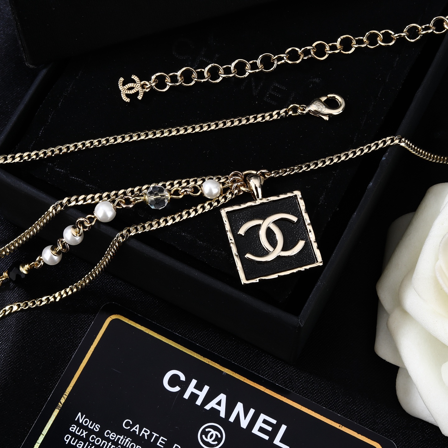 Chanel Goose Series CC Square Charm Pearl Beaded Waist Chain necklace Gold-tone metal with white faux pearls black faceted beads clear faceted beads and black enamel CC charm 80cm