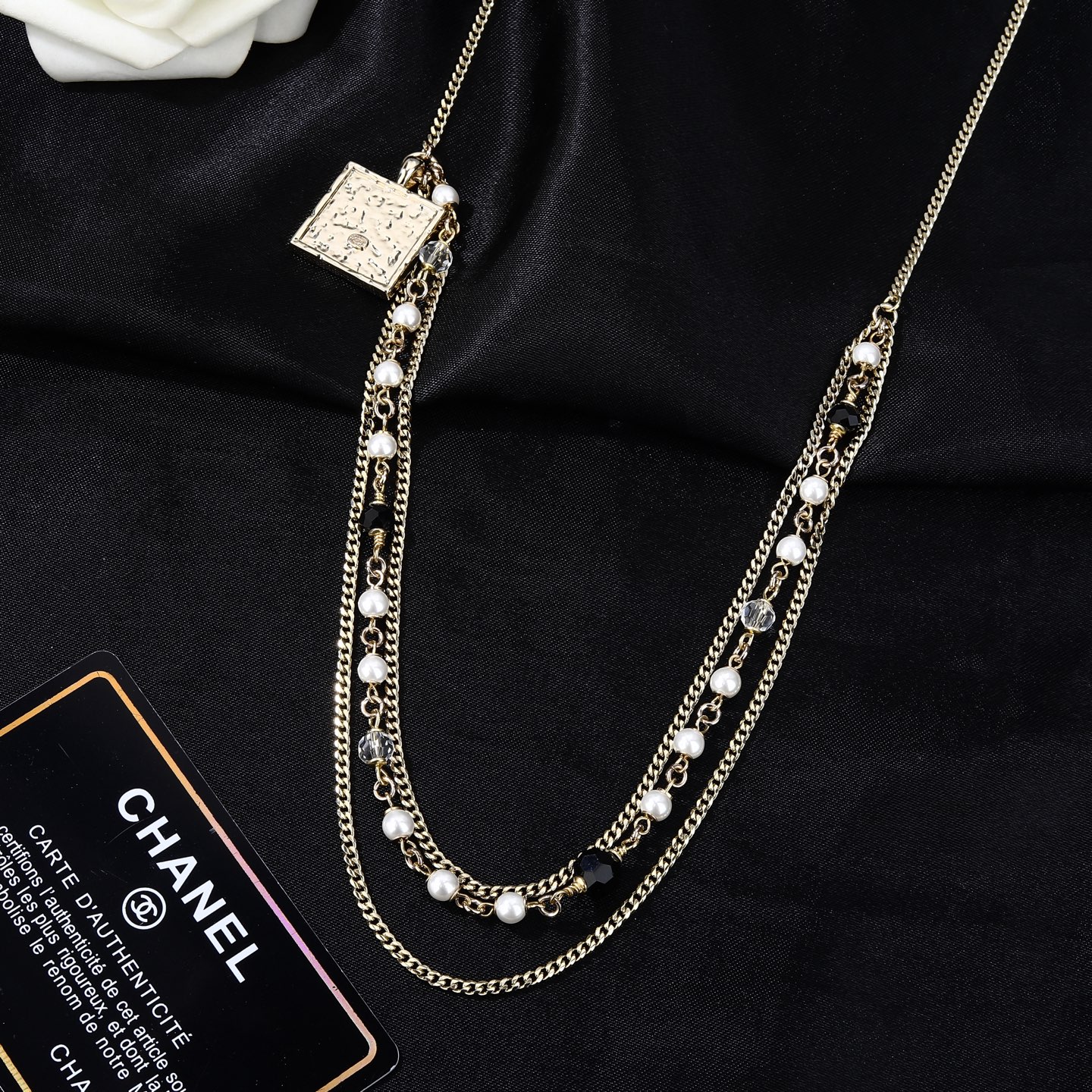 Chanel Goose Series CC Square Charm Pearl Beaded Waist Chain necklace Gold-tone metal with white faux pearls black faceted beads clear faceted beads and black enamel CC charm 80cm