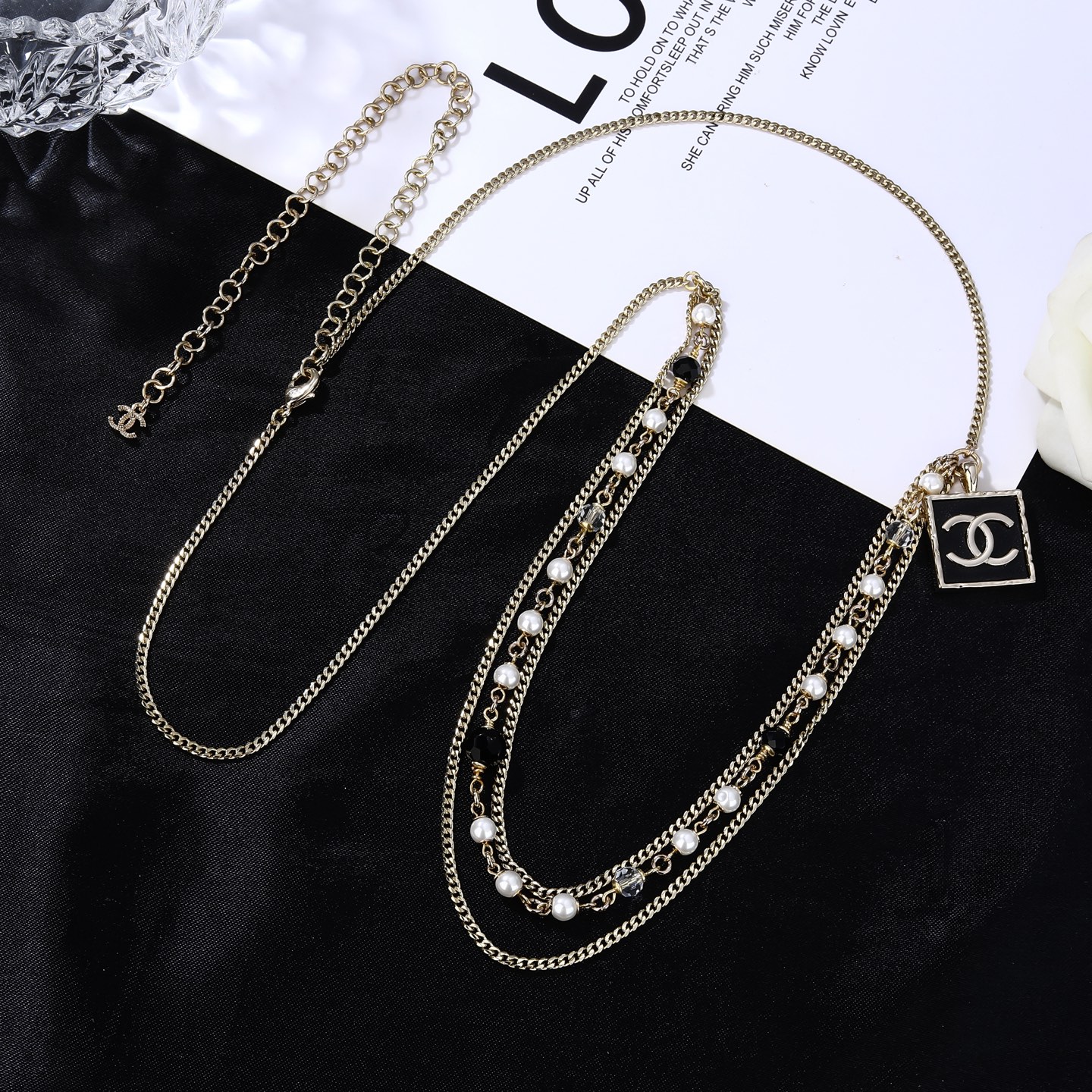 Chanel Goose Series CC Square Charm Pearl Beaded Waist Chain necklace Gold-tone metal with white faux pearls black faceted beads clear faceted beads and black enamel CC charm 80cm