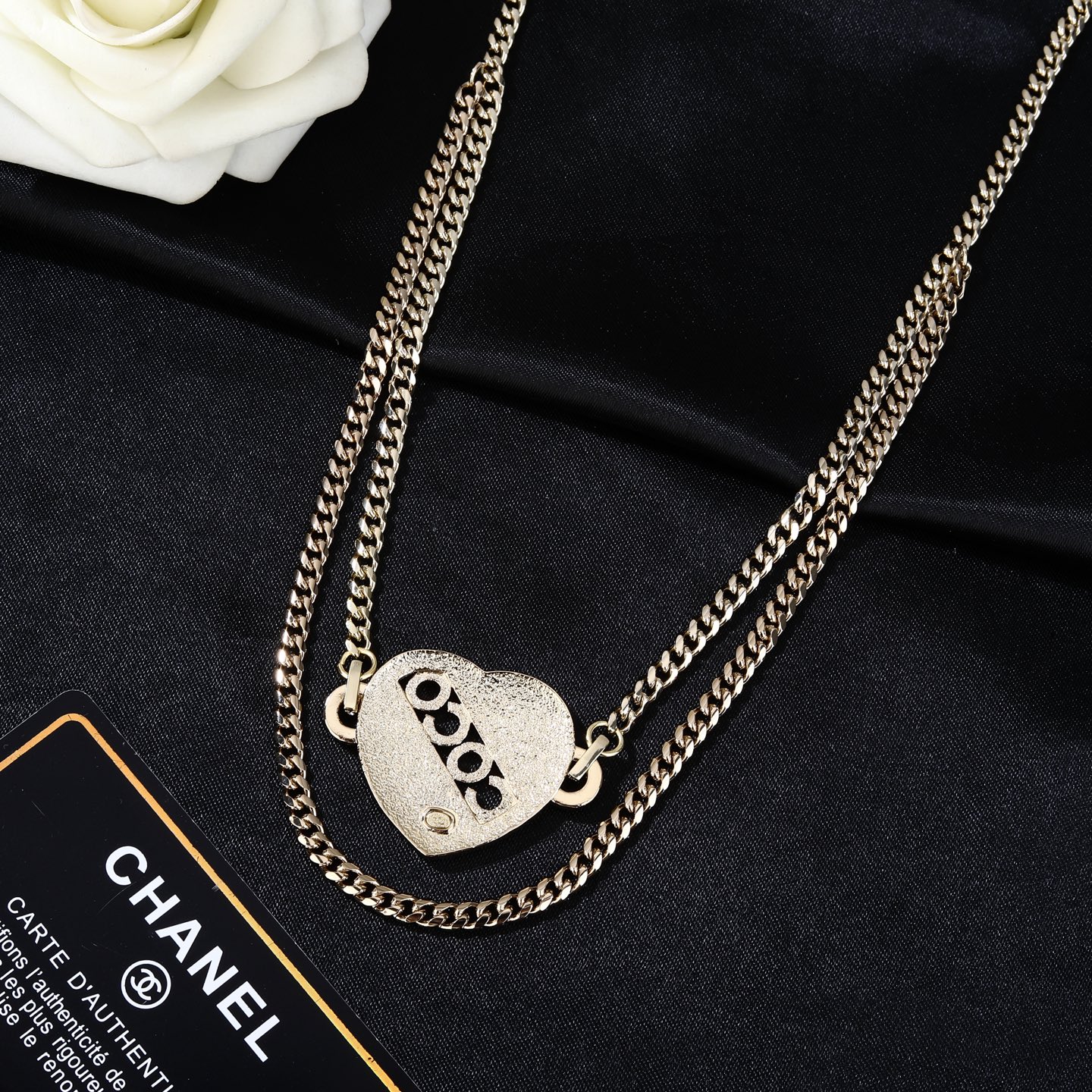 Chanel Coco Heart Waist Chain necklace Light gold tone metal with clear crystal and champagne glitter accents white enamel detail 80cm with 15cm extension