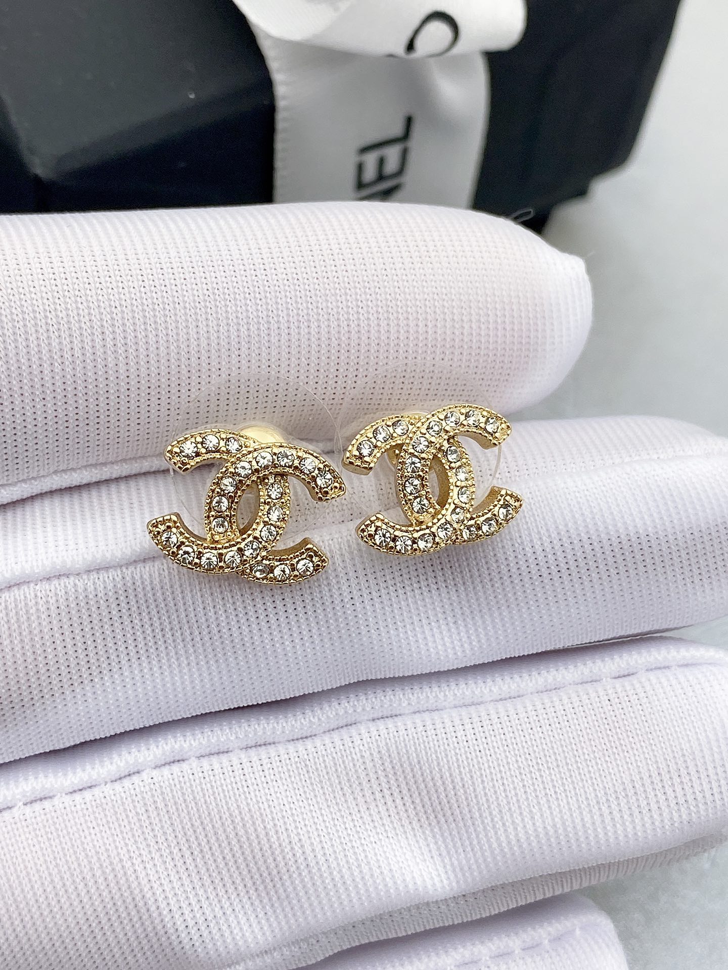 Chanel CC Crystal Stud Earrings earrings silver-tone metal with clear crystals gold-tone metal with clear crystals 1cm diameter