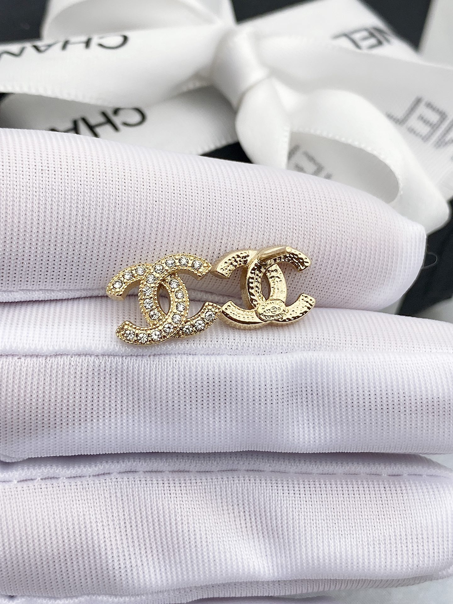Chanel CC Crystal Stud Earrings earrings silver-tone metal with clear crystals gold-tone metal with clear crystals 1cm diameter