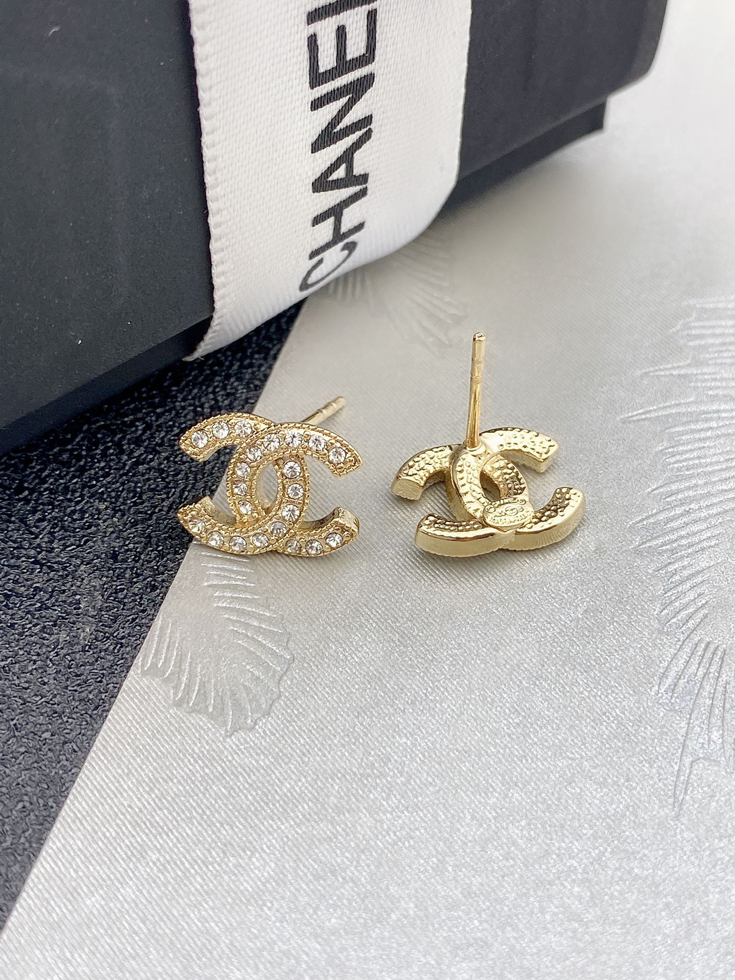 Chanel CC Crystal Stud Earrings earrings silver-tone metal with clear crystals gold-tone metal with clear crystals 1cm diameter