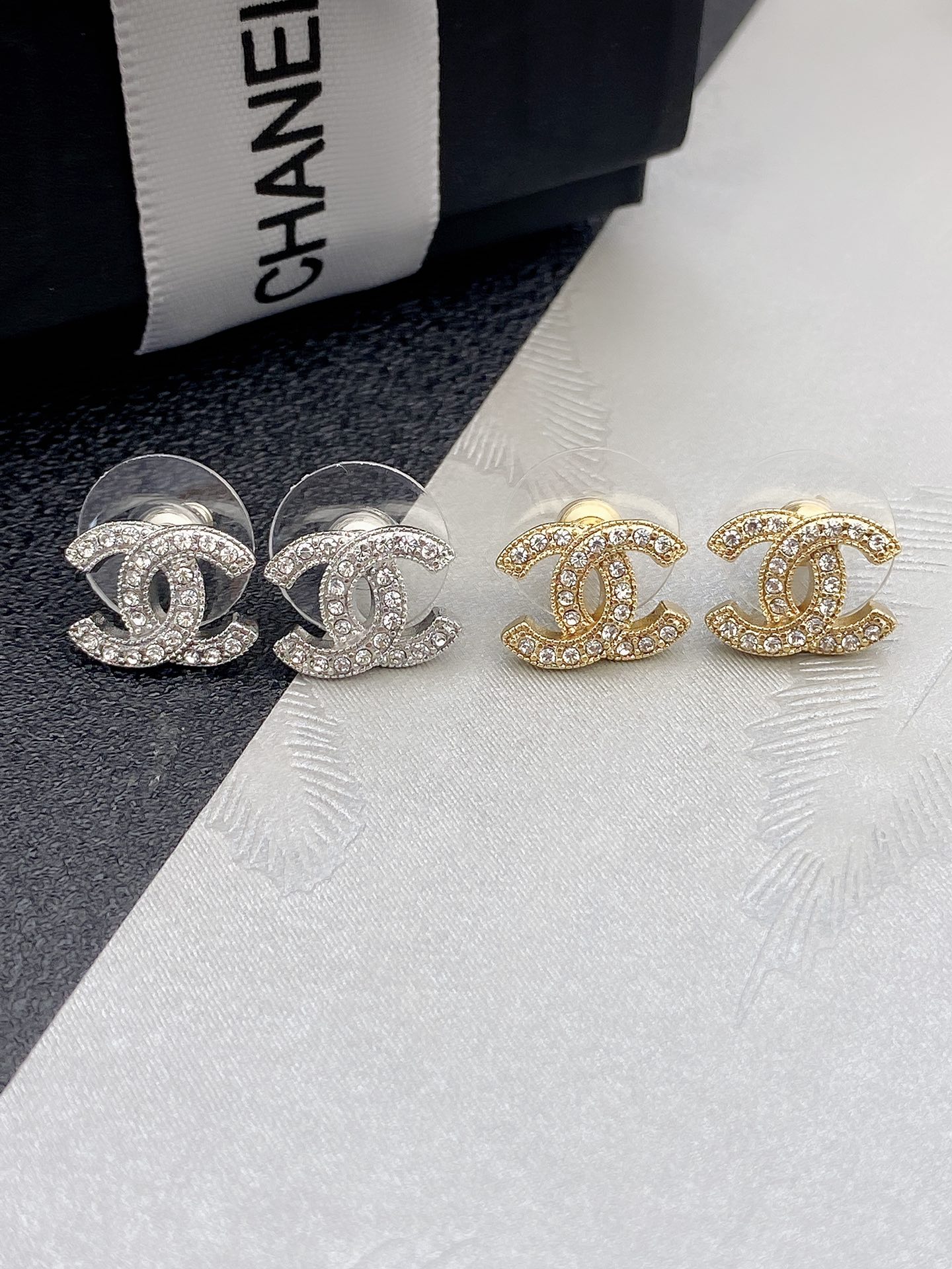 Chanel CC Crystal Stud Earrings earrings silver-tone metal with clear crystals gold-tone metal with clear crystals 1cm diameter