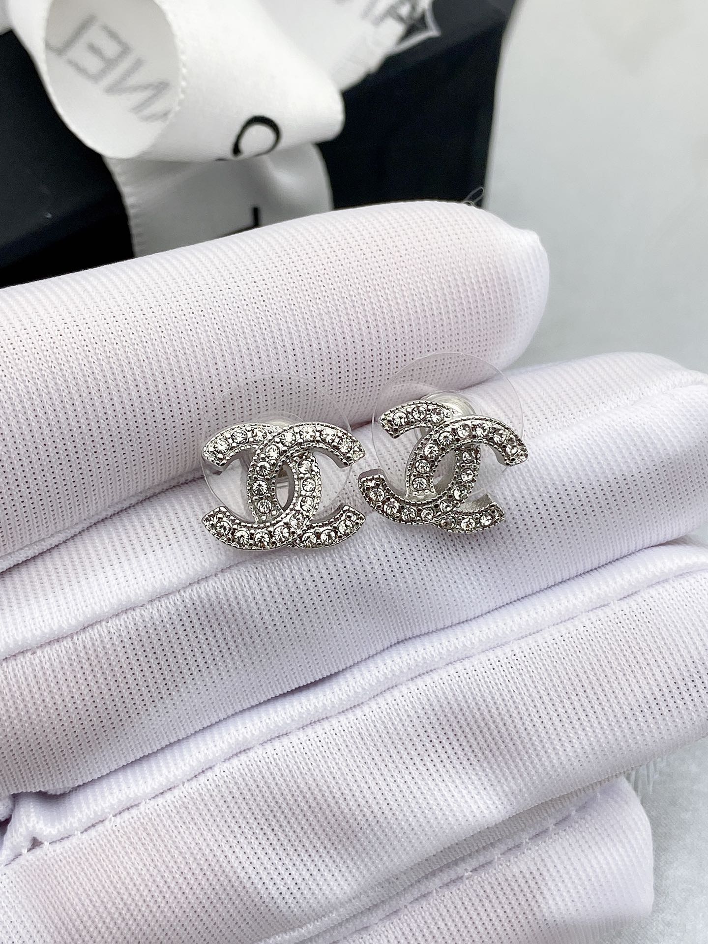Chanel CC Crystal Stud Earrings earrings silver-tone metal with clear crystals gold-tone metal with clear crystals 1cm diameter
